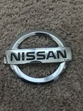 Genuine OEM Nissan S15 Rear “Nissan” badge - 84890-85F01 (Chrome)